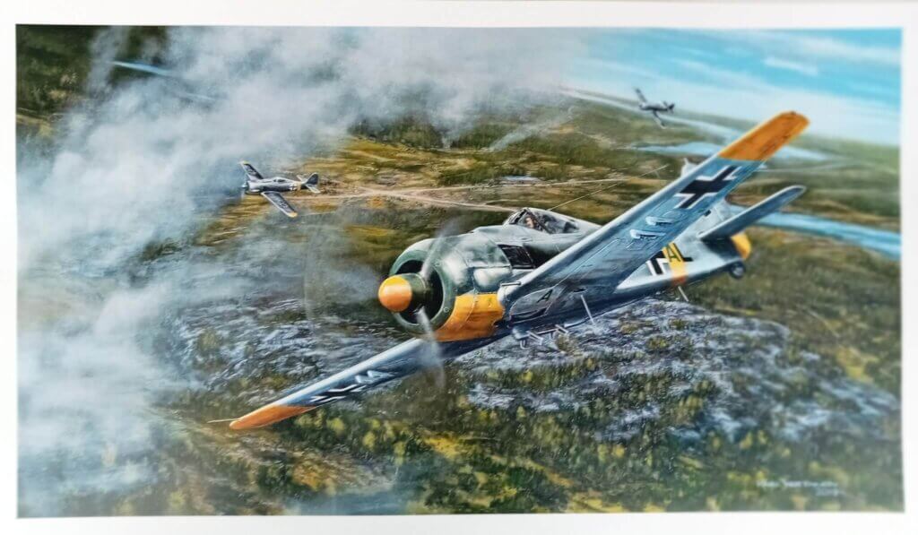 Ilmailutaiteilija Kari Vertasen vedoksessa osasto Kuhlmeyn Focke Wulfit lentävät Portinhoikan yläpuolella.