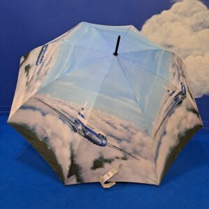 Avattu iso sateenvarjo Convair- lentokoneen kuvituksella.